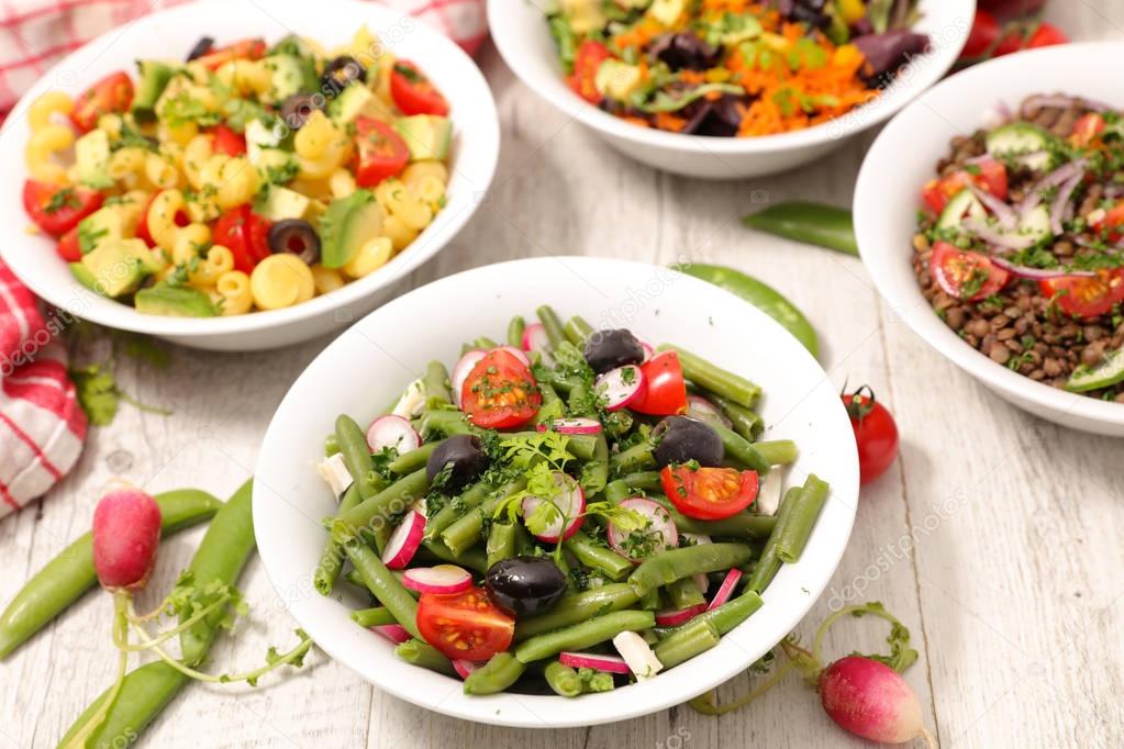 set of bowls with healthy vegetarian dishes 