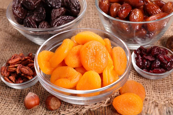 selection of dry fruits on sackcloth background