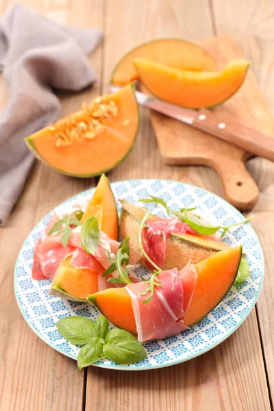 Melon Pieces Prosciutto Plate Wooden Table — Stock Photo, Image