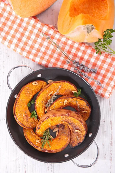 grilled pumpkin slices and herb