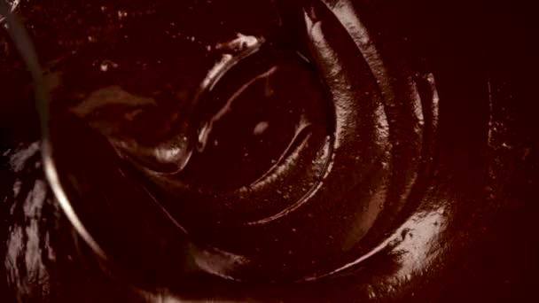 Zbliżenie Materiał Filmowy Łyżki Mieszającej Gorącą Czekoladę Patelni — Wideo stockowe