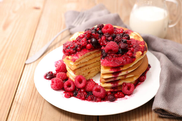 stack of pancake with berry fruit