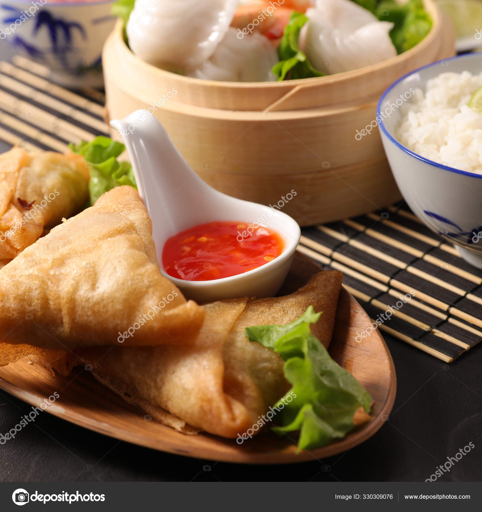 Assorted Asian Food Spring Roll Samossa Dim Sum Fried Noodles Stock