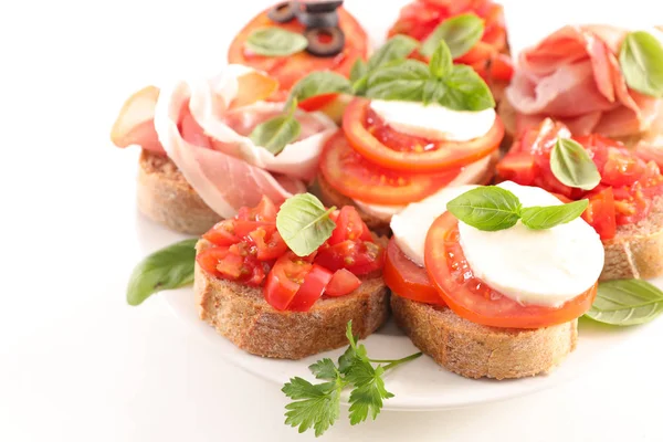 Assorted Bruschetta Bread Tomato Cheese Basil — Stock Photo, Image