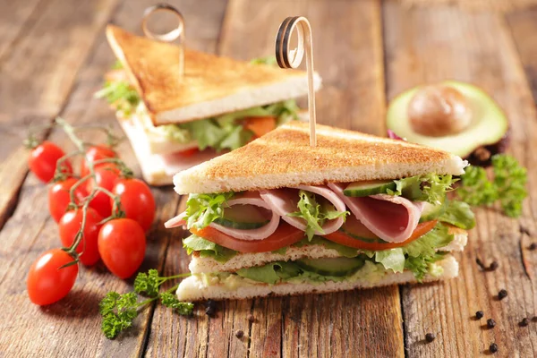 club sandwich- toasted sandwich with ham, tomato, lettuce and cucumber