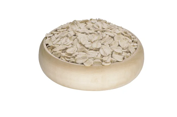 Beyaz bir arka plan üzerine bir kase yulaf ezmesi