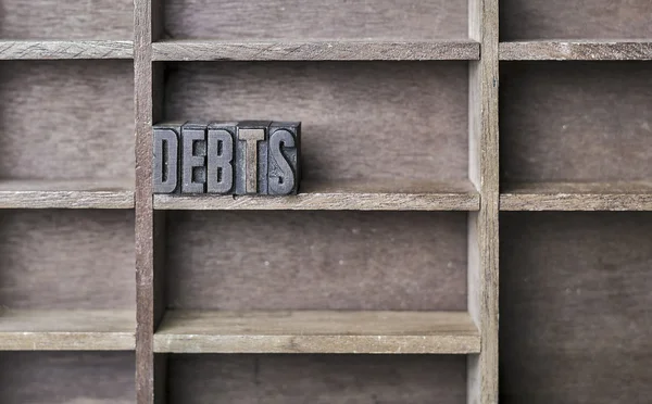 Wooden Letter Debts — Stock Photo, Image