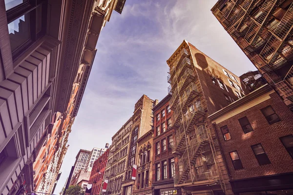 Old apartment buildings and fire escapes — Stock Photo, Image