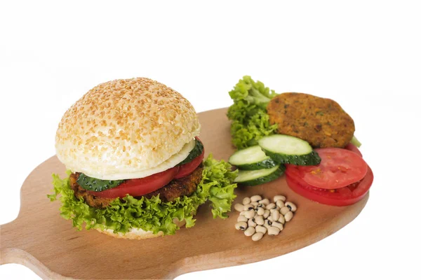 Vegetarian Burger with vegetables and a cutlet made of beans — Stock Photo, Image
