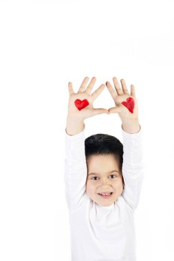 Boy with raised hands painted with hearts clipart