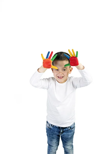 Menino com mãos pintadas coloridas Imagem De Stock