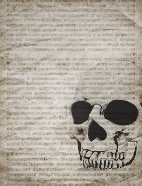 Fondo de Halloween con cráneo en viejo periódico vintage — Foto de Stock