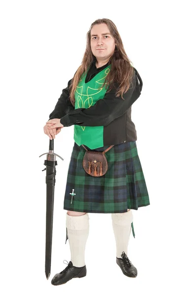 Scottish man in traditional national costume with sword — Stock Photo, Image