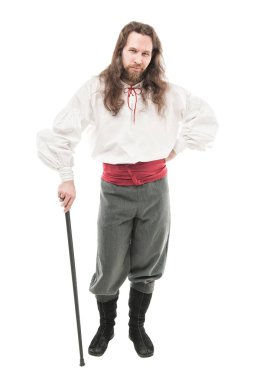 Tarihsel korsan kostüm izole kamışı ile yakışıklı adam 