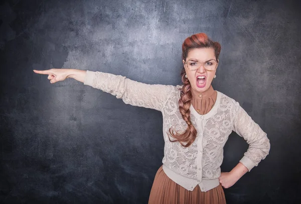Angry screaming teacher pointing out — Stock Photo, Image