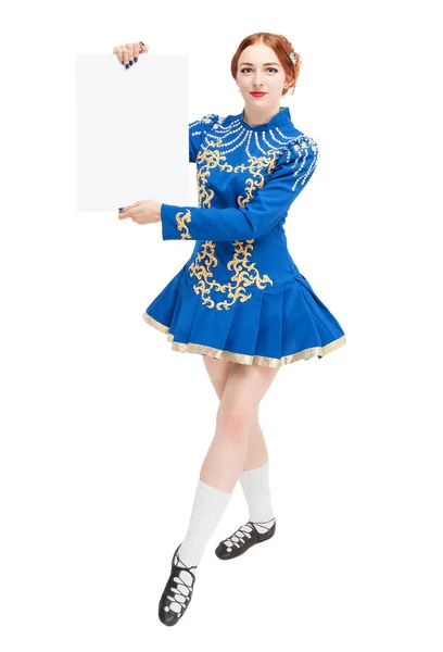 Beautiful woman in costume for irish dance with empty banner — Stock Photo, Image