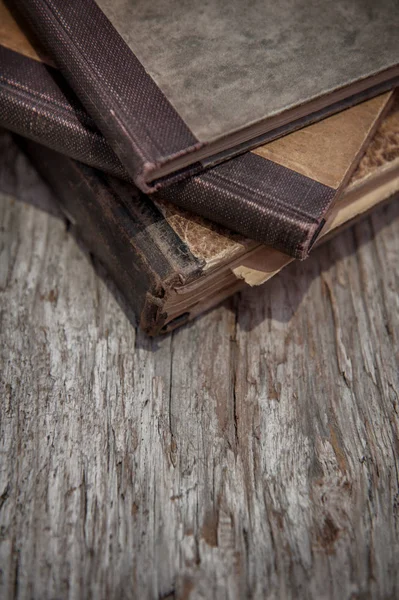 Vintage old books on the old wood — Stock Photo, Image