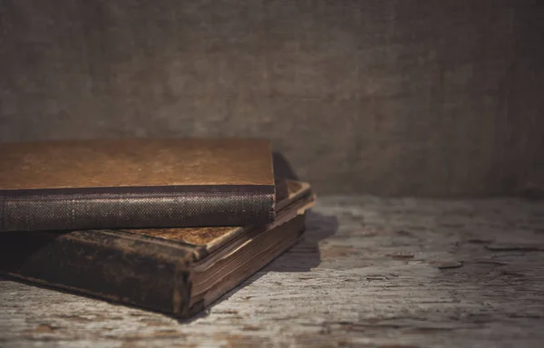 Vintage old books on the old wood — Stock Photo, Image