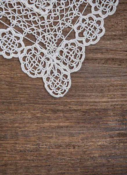 Vintage background with lace on the old wood — Stock Photo, Image