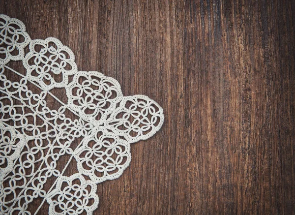 Vintage background with lace on the old wood — Stock Photo, Image