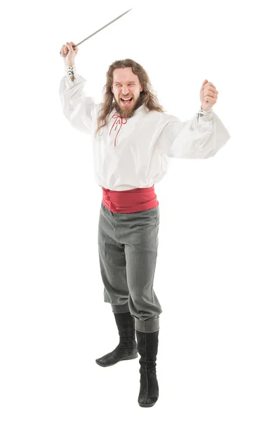 Handsome screaming man in historical pirate costume with blade — Stock Photo, Image