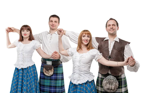 Две пары танцоров шотландского танца — стоковое фото