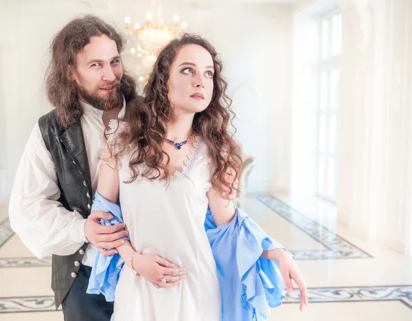 Beautiful passionate couple woman and man in medieval clothes — Stock Photo, Image