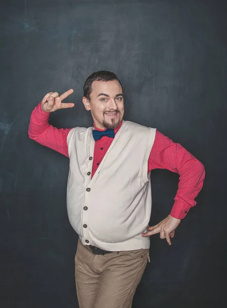 Funny vintage style man dancing on chalkboard background — 스톡 사진