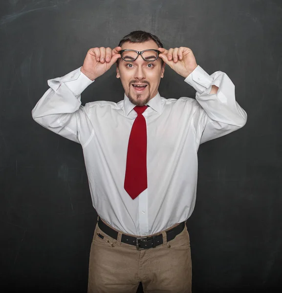 Portrait Funny Young Handsome Man Laughing Chalkboard Background — Stockfoto