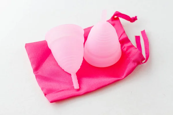 Roze siliconen vaginale beker op roze zakken — Stockfoto