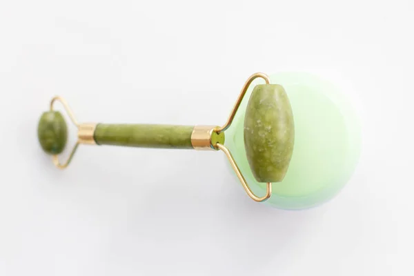 Massage roller for the face with two heads of jade stone — Stock Photo, Image