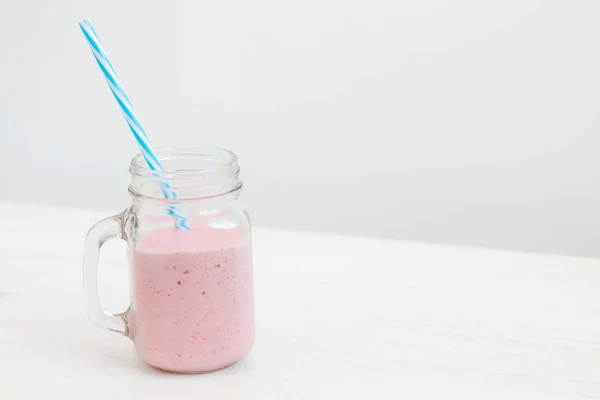 Glass jar of milkshake smoothie on white background — Stock Photo, Image