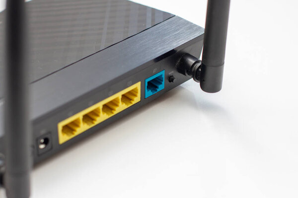 network connectors wireless wifi router on a white table