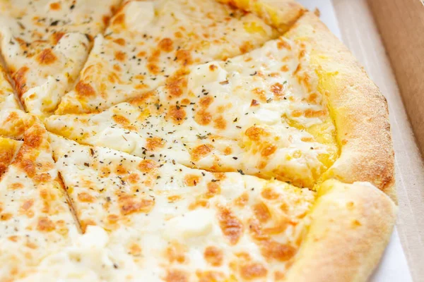 Vegetarian pizza margarita with cheese in a cardboard box — Stock Photo, Image