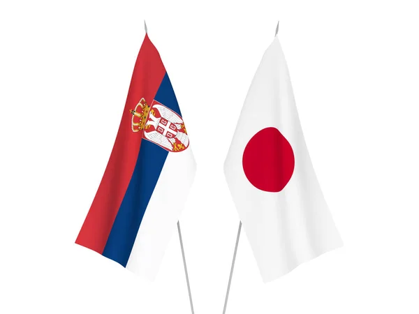 Japán és Szerbia zászlói — Stock Fotó