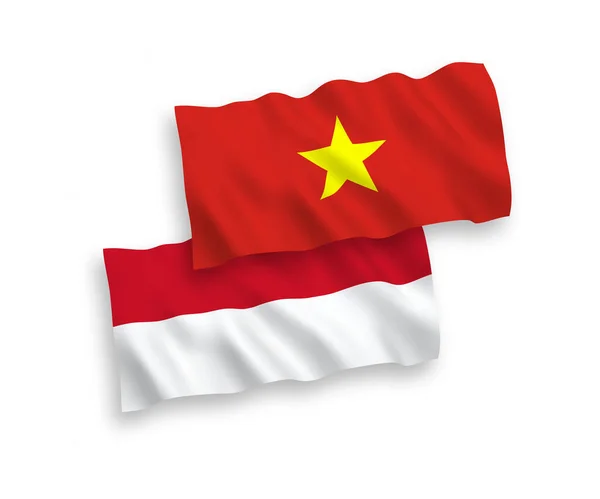 흰 바탕에 있는 인도네시아와 베트남의 깃발 — 스톡 벡터