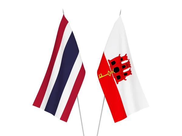 Flagi Gibraltaru i Tajlandii — Zdjęcie stockowe