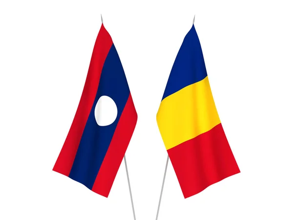 Румунія і Лаос прапори — стокове фото
