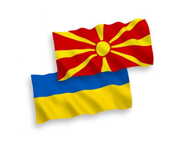 Banderas de Macedonia del Norte y Ucrania sobre fondo blanco — Archivo Imágenes Vectoriales