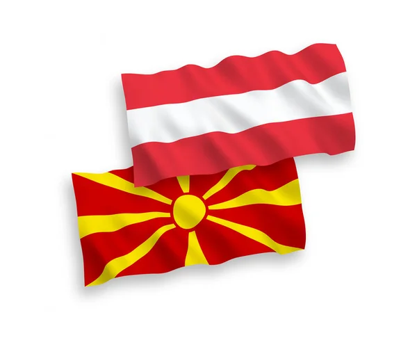Vlajky Rakouska a severní Makedonie na bílém pozadí — Stockový vektor