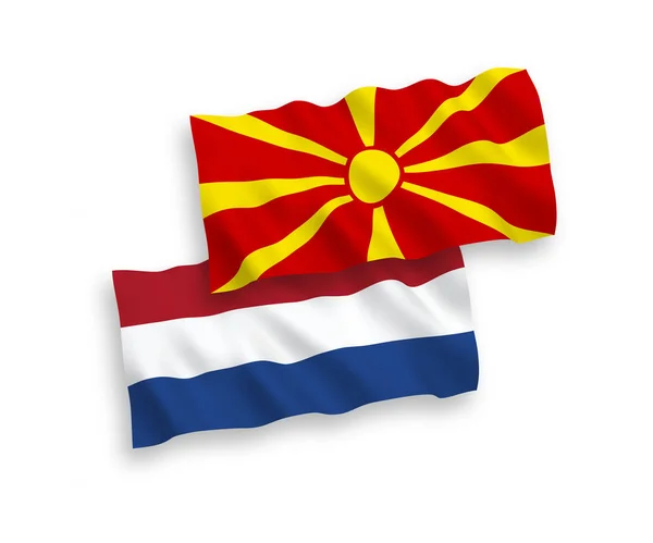 Banderas de Macedonia del Norte y Holanda sobre fondo blanco — Archivo Imágenes Vectoriales