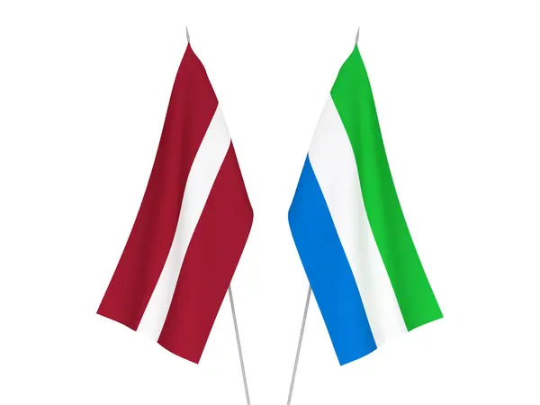 Flagi Łotwy i Sierra Leone — Zdjęcie stockowe