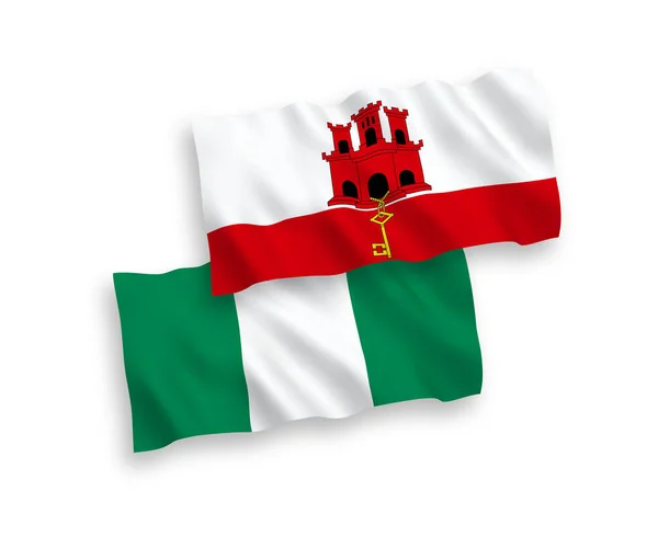 Vlaggen van Nigeria en Gibraltar op een witte achtergrond — Stockvector
