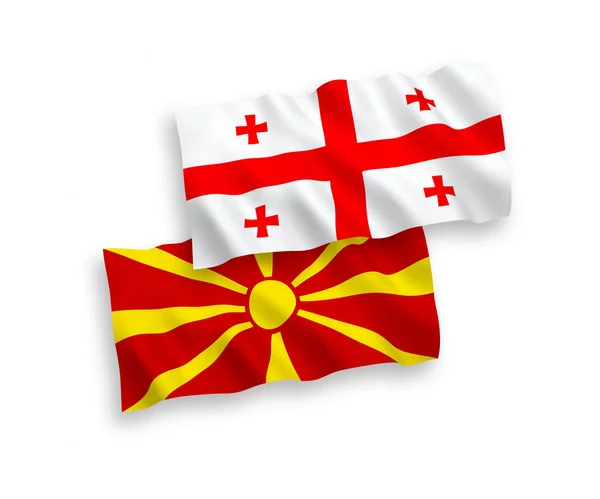 Vlajky severní Makedonie a Gruzie na bílém pozadí — Stockový vektor