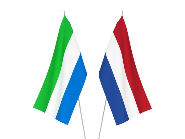 Nederland en Sierra Leone vlaggen — Stockfoto
