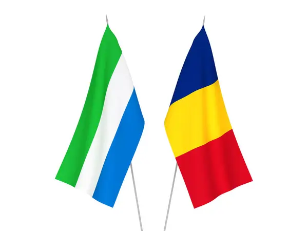 Romania and Sierra Leone flags — ストック写真