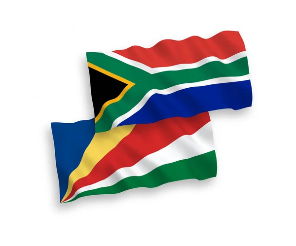 Banderas de Seychelles y República de Sudáfrica sobre fondo blanco — Vector de stock