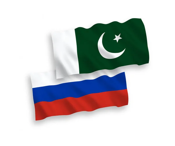 Flaggen von Pakistan und Russland auf weißem Hintergrund — Stockvektor