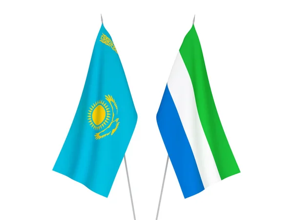Kazakhstan and Sierra Leone flags — Stock Photo, Image