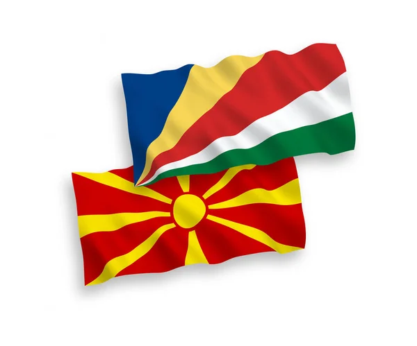 Beyaz arkaplanda Seyşeller ve Kuzey Makedonya bayrakları — Stok Vektör